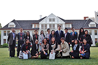 Representatives of Hong Kong universities and Fudan University pose for a group photo on Fudan campus